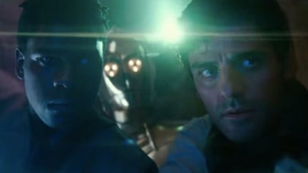 Poe Dameron and Finn stand together in the dark in Star Wars: The Rise of Skywalker trailer.