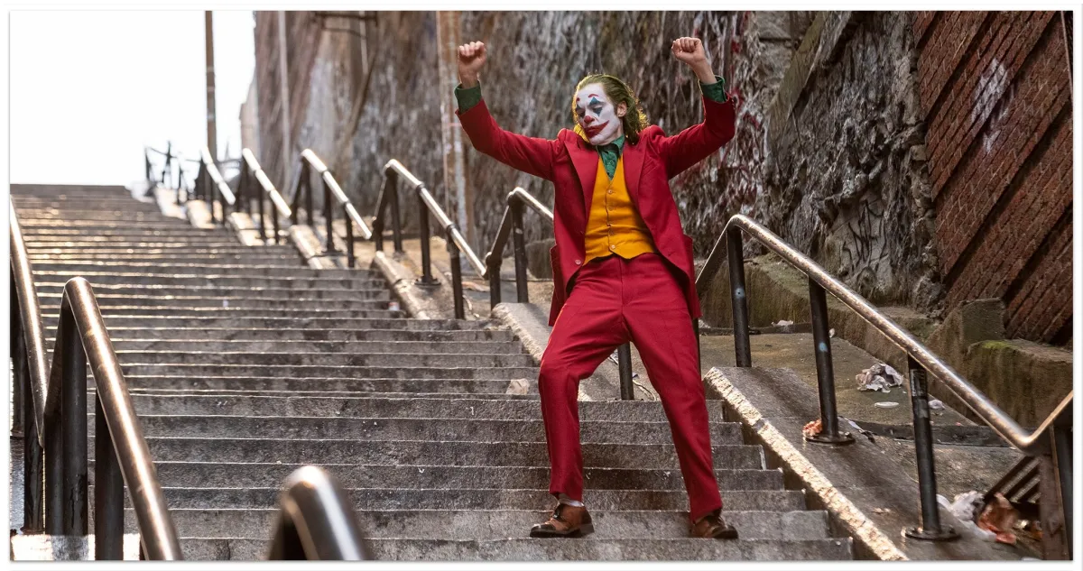 Joker dancing on the stairs.