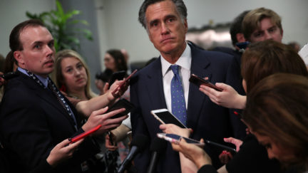 Mitt Romney surrounded by cell phones