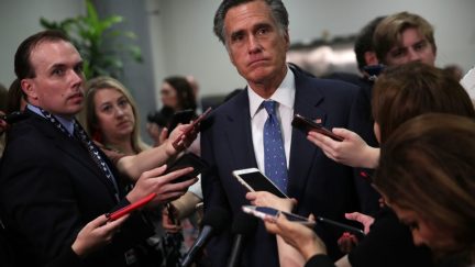 Mitt Romney surrounded by cell phones