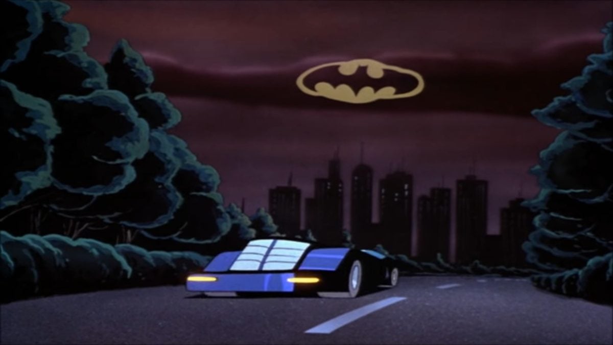 The Batmobile under the Bat signal in Batman: Mask of the Phantasm