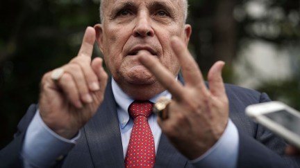 Rudy Giuliani counts on his fingers.