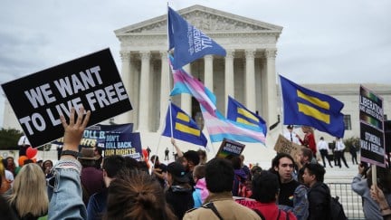 LGBTQ activists protest in front of the U.S. Supreme Court