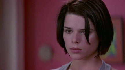 Sidney (Neve Campbell) looks for clues in Scream 2.