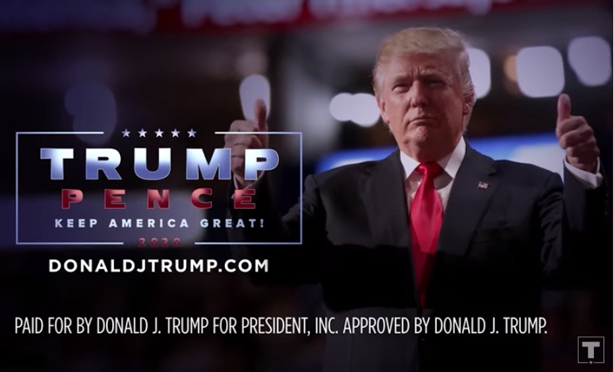 Donald Trump gives double thumbs up in a campaign ad.
