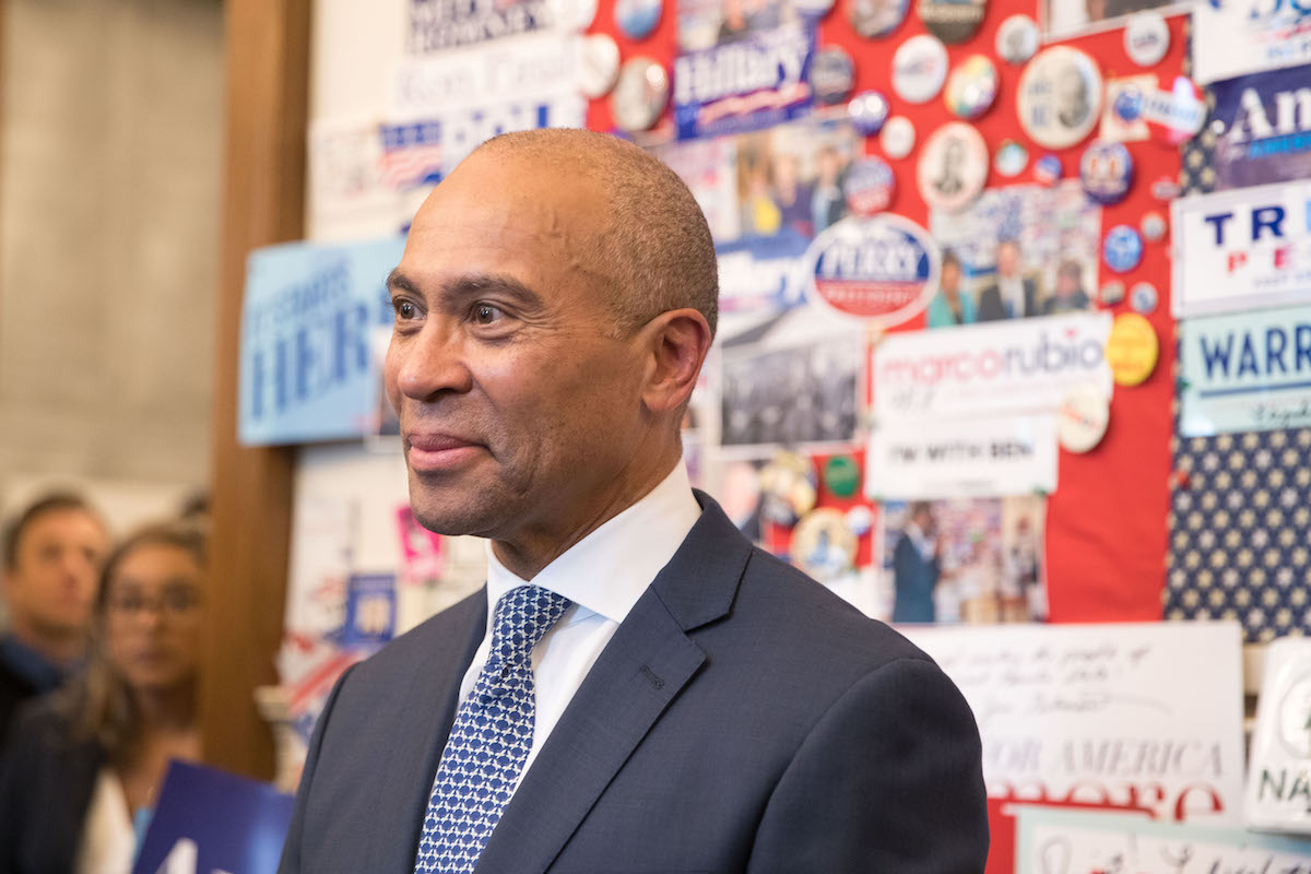 Former Massachusetts Governor Deval Patrick stands in the visitor center of the New Hampshire State House after he filed his paperwork to run for president in 2020
