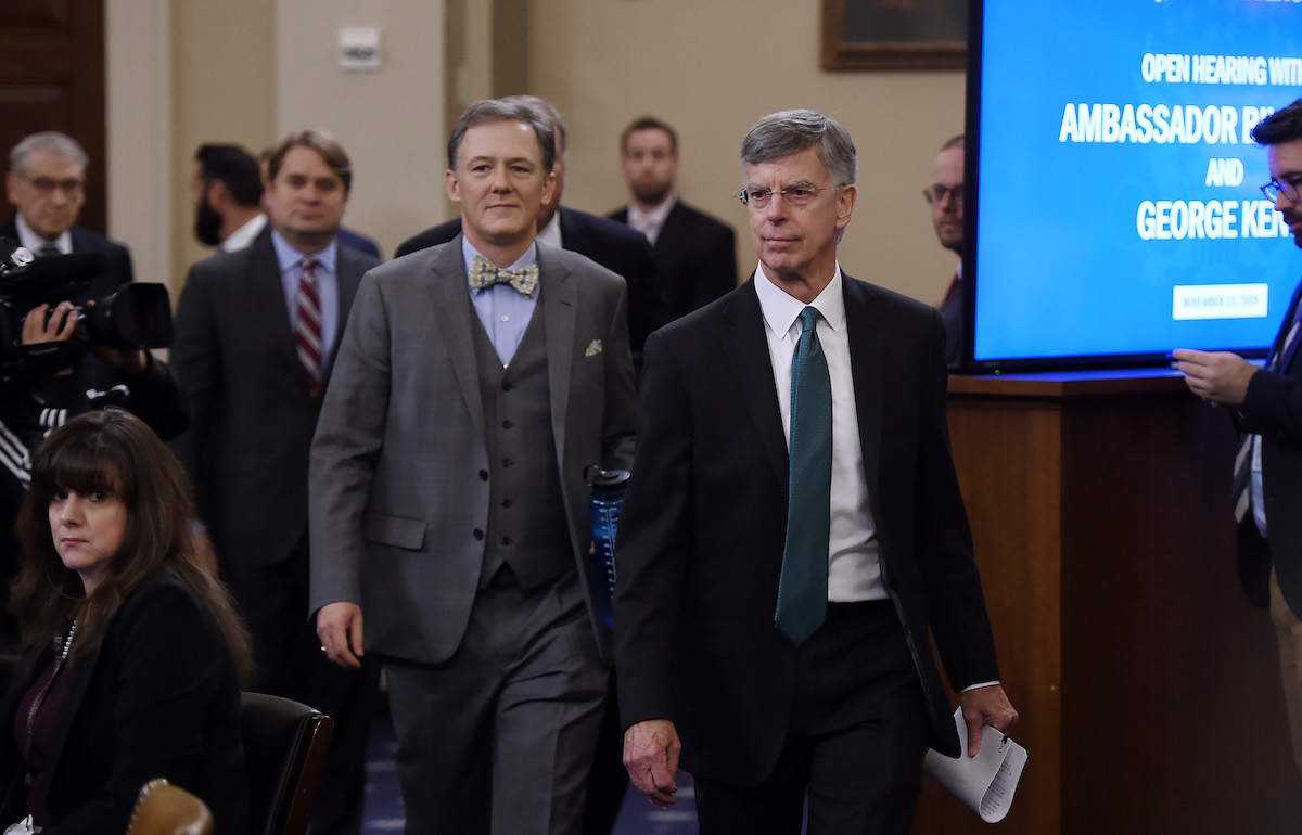 George Kent, the deputy assistant secretary of state for European and Eurasian Affairs and Ukrainian Ambassador Bill Taylor(front), the top diplomat in the US embassy in Ukraine arrive in the impeachment inquiry into US President Donald Trump in Washington, DC