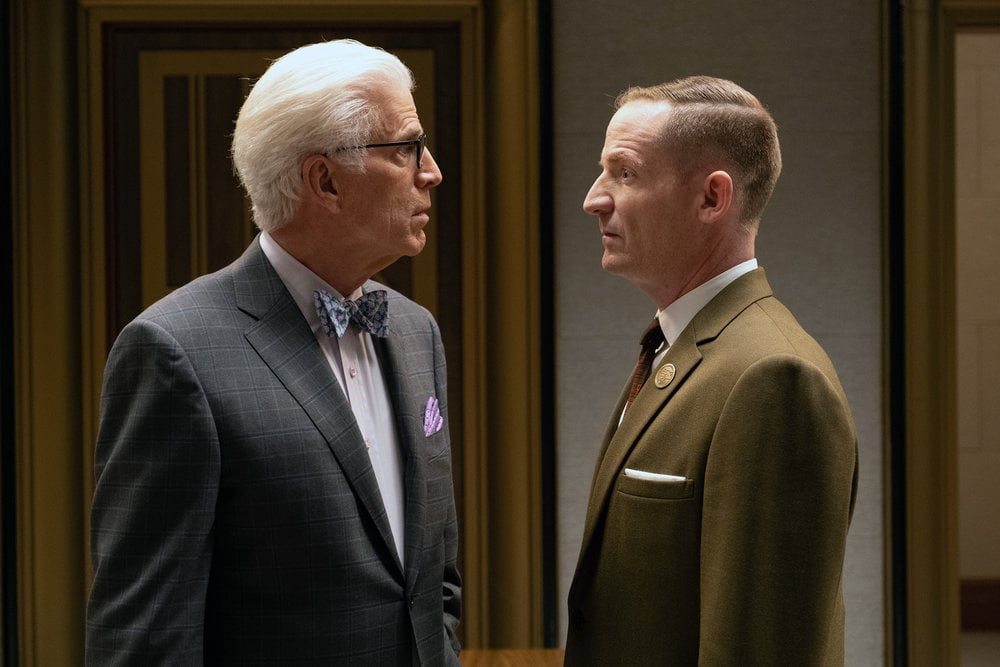 THE GOOD PLACE -- "The Funeral to End All Funerals" Episode 408 -- Pictured: (l-r) Ted Danson as Michael, Marc Evan Jackson as Shawn -- (Photo by: Colleen Hayes/NBC)