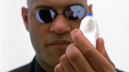 Morpheus in The Matrix, photo edited so he's holding milk instead of a battery.