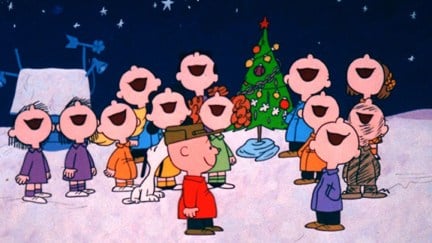 Peanuts characters singing Christmas carols in A Charlie Brown Christmas.