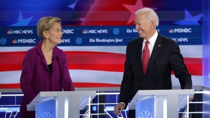 Elizabeth Warren (D-MA) and former Vice President Joe Biden look at each other during the Democratic Presidential Debate