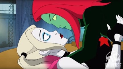 Harley Quinn and Poison Ivy, lying one on top of the other face-to-face, in Harley's animated series.