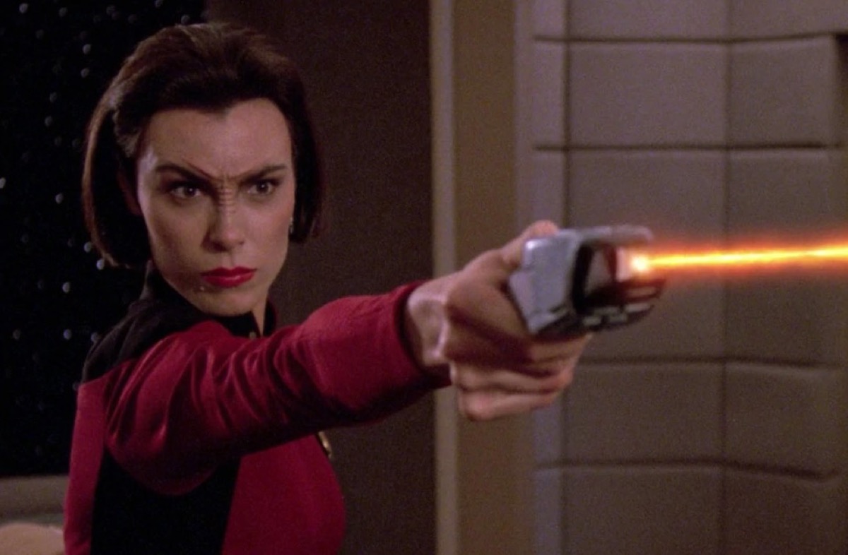 Ro Laren firing a phaser in Star Trek: The Next Generation.