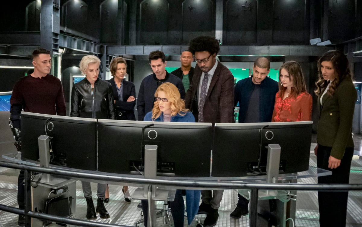 Arrow -- "Fadeout" -- Image Number: AR810B_0438b.jpg -- Pictured (L-R): Colton Haynes as Roy Harper, Katie Cassidy as Laurel Lance/Black Siren, Audrey Marie Anderson as Lyla Michaels, Joe Dinicol as Rory Regan/Ragman, Emily Bett Rickards as Felicity Smoak, David Ramsey as John Diggle/Spartan, Echo Kellum as Curtis Holt/Mr. Terrific, Rick Gonzalez as Rene Ramirez/Wild Dog, Willa Holland as Thea Queen and Juliana Harkavy as Dinah Drake/Black Canary -- Photo: Colin Bentley/The CW -- © 2020 The CW Network, LLC. All Rights Reserved.