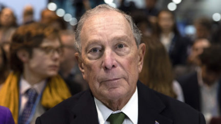 Democratic presidential candidate for US and former New York City Mayor Michael Bloomberg looks into the camera at a campaign event.