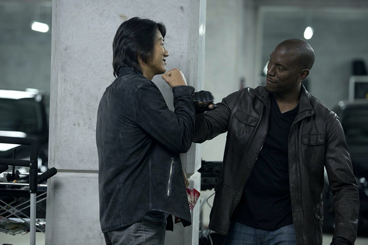 Sung Kang and Tyrese Gibson in Furious 6 (2013)