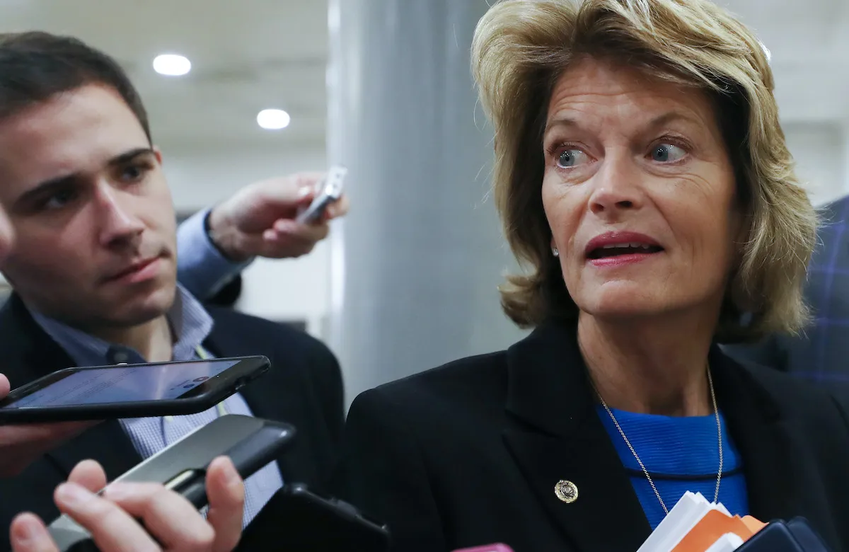 Sen. Lisa Murkowski (R-AK) speaks to reporters as she arrives for the continuation of the Senate impeachment trial of President Donald Trump