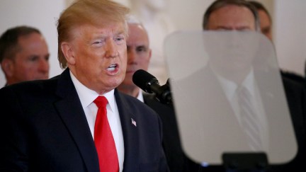 Donald Trump reads from a teleprompter while speaking from the White House