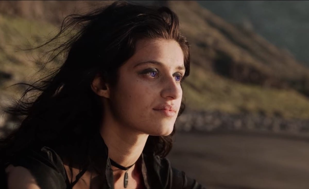 Yennefer talking to a dead baby on the beach in Netflix's The Witcher.