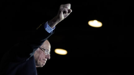 SAN ANTONIO, TX - FEBRUARY 22: Democratic presidential candidate Sen. Bernie Sanders (I-VT) raises his fist as he arrives onstage after winning the Nevada caucuses during a campaign rally at Cowboys Dancehall on February 22, 2020 in San Antonio, Texas. With early voting underway in Texas, Sanders is holding four rallies in the delegate-rich state this weekend before traveling on to South Carolina. Texas holds their primary on Super Tuesday March 3rd, along with over a dozen other states (Photo by Drew Angerer/Getty Images)