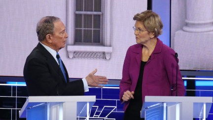 Democratic presidential candidates (L-R) former New York City Mayor Mike Bloomberg and Sen. Elizabeth Warren (D-MA) speak during the Democratic presidential primary debate