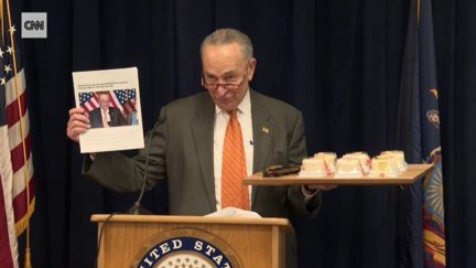 chuck schumer with cheesecake