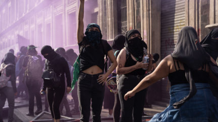 MEXICO CITY, MEXICO - MARCH 08: Demonstrators clah with police during a rally on International Women's Day on March 8, 2020 in Mexico City, Mexico. (Photo by Toya Sarno Jordan/Getty Images)