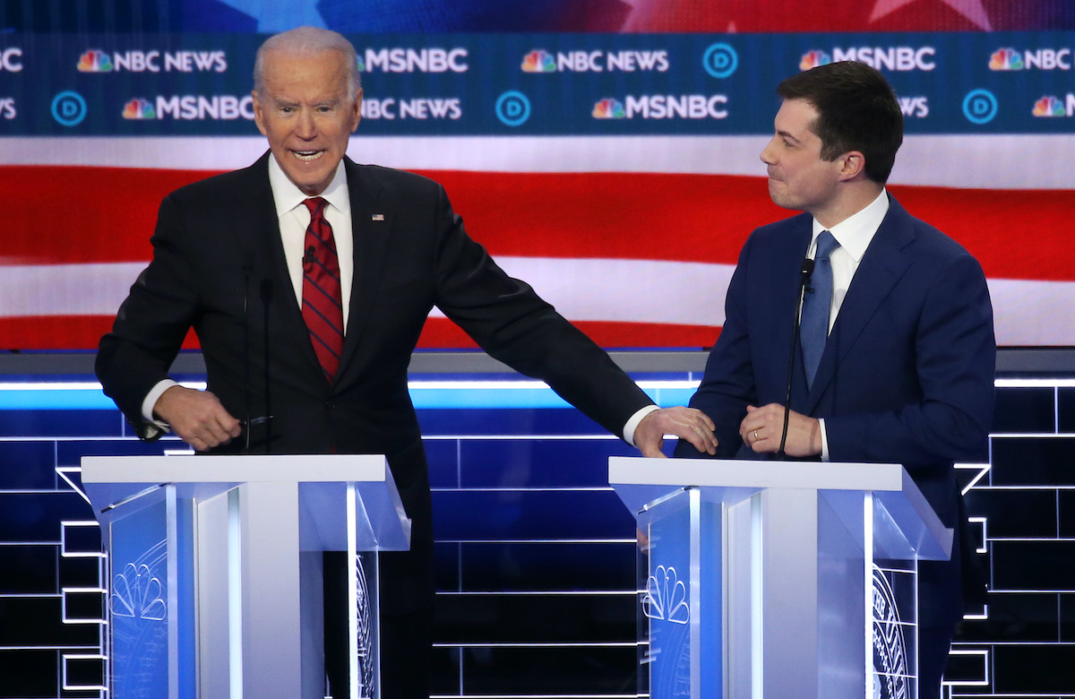 Joe Biden speaks as former South Bend, Indiana mayor Pete Buttigieg listens