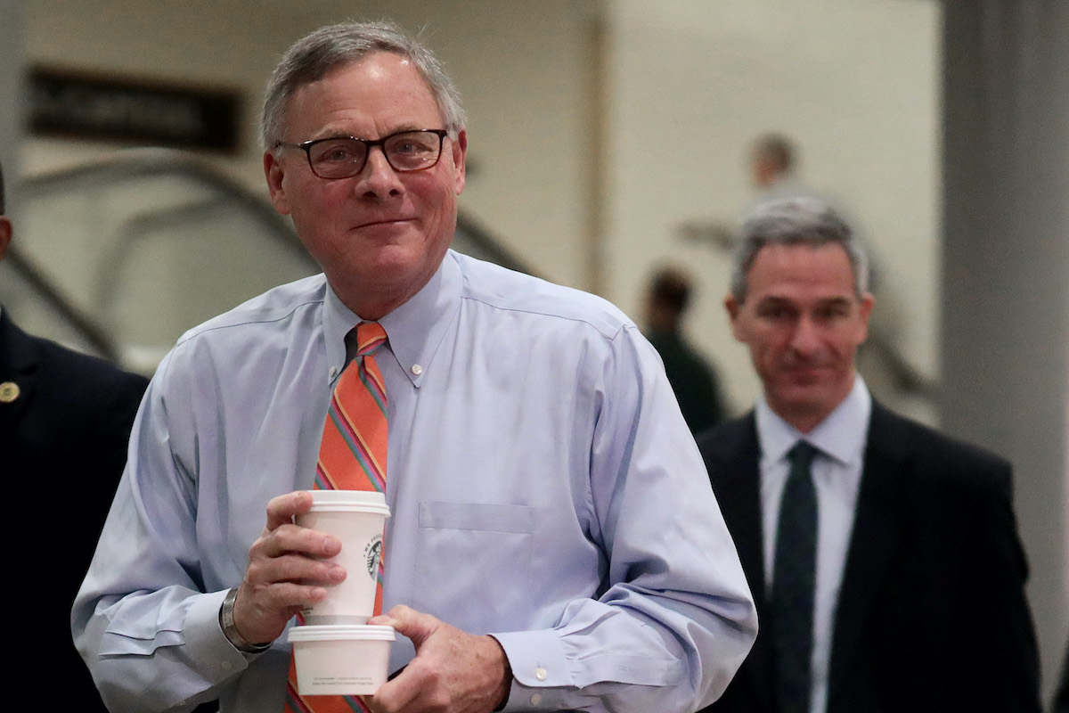 Sen. Richard Burr (R-NC) (L) and Acting Deputy Homeland Security Secretary Ken Cuccinelli walk to a briefing from administration officials on the coronavirus