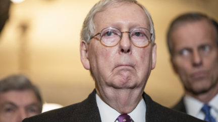 Senate Majority Leader Mitch McConnell makes a stupid frowny face for reporters.