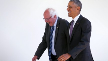 Bernie Sanders (I-VT) (L) walks with President Barack Obama (R) through the Colonnade as he arrives at the White House for an Oval Office meeting