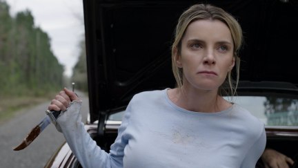 Betty Gilpin holds a bloody knife in a scene from The Hunt.