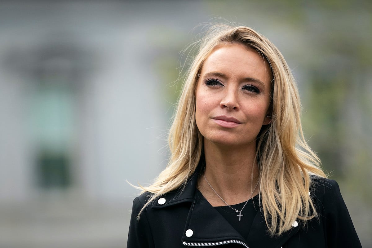 New White House Press Secretary Kayleigh McEnany wears a leather jacket and looks at the camera.