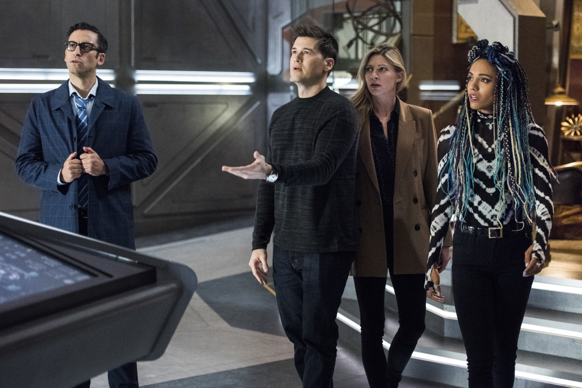 Legends of Tomorrow -- "The Great British Fake Off" -- Image Number: LGN510b_0164b.jpg -- Pictured (L-R): Adam Tsekhman as Agent Gary Green, Nick Zano as Nate Heywood/Steel, Jes Macallan as Ava Sharpe and Maisie Richardson-Sellers as Charlie -- Photo: Dean Buscher/The CW -- © 2020 The CW Network, LLC. All Rights Reserved.