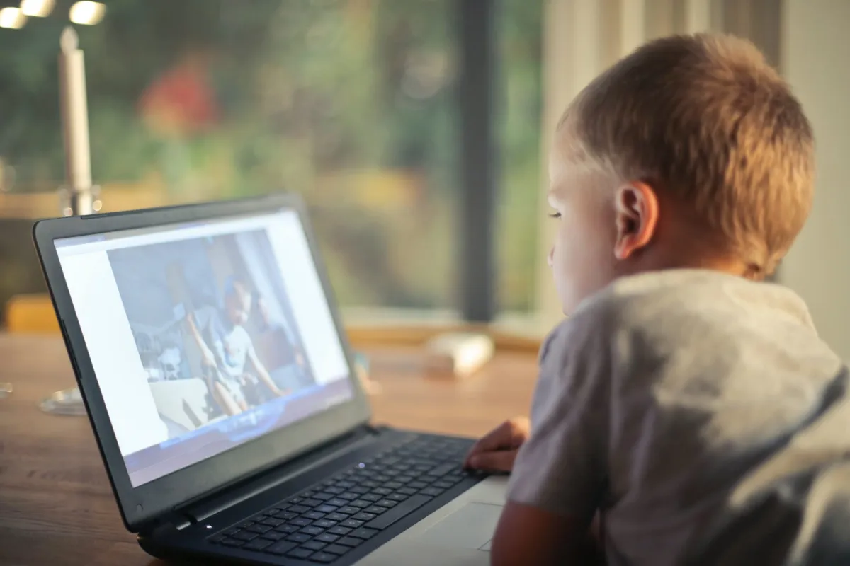 child watching video on computer