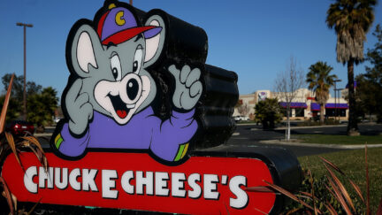 A sign for Chuck E. Cheese's.