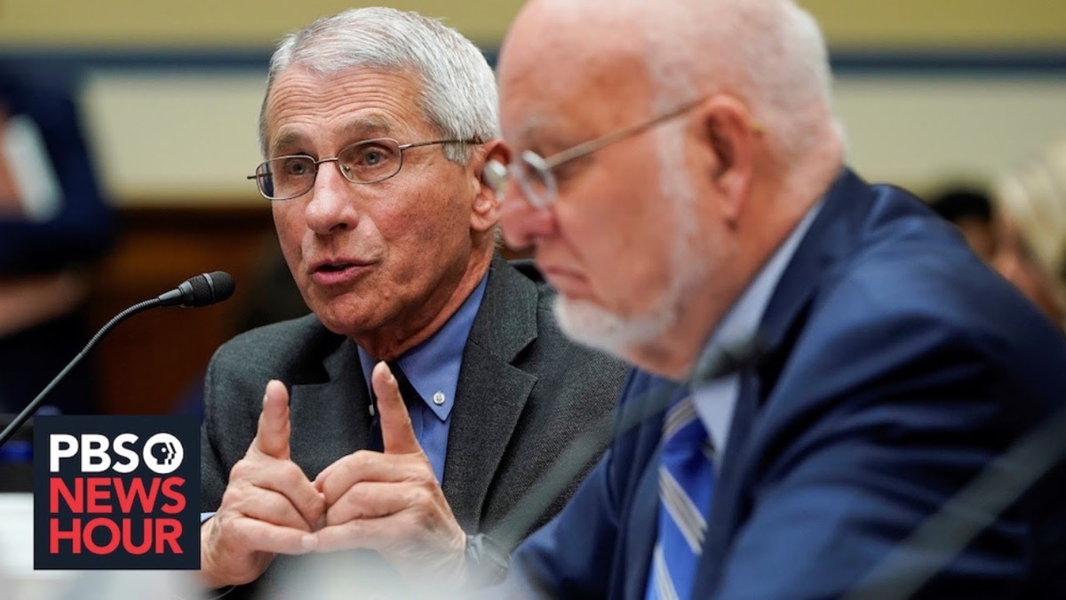 Dr. Anthony Fauci speaking in front of a microphone.