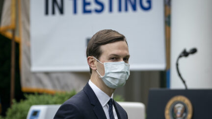 Jared Kushner wears a face mask while as he departs a press briefing