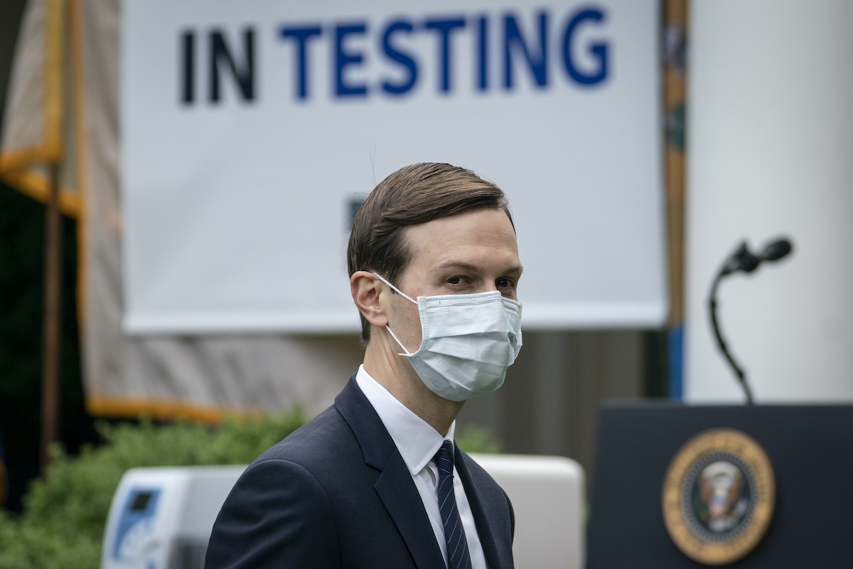 Jared Kushner wears a face mask while as he departs a press briefing