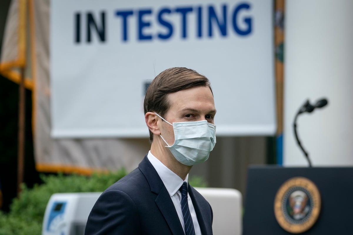 Jared Kushner wears a face mask while as he departs a press briefing