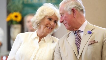 BUILTH WELLS, WALES - JULY 04: Prince Charles, Prince of Wales and Camilla, Duchess of Cornwall look at eachother as they reopen the newly-renovated Edwardian community hall The Strand Hall during day three of a visit to Wales on July 4, 2018 in Builth Wells, Wales. (Photo by Chris Jackson/Getty Images)