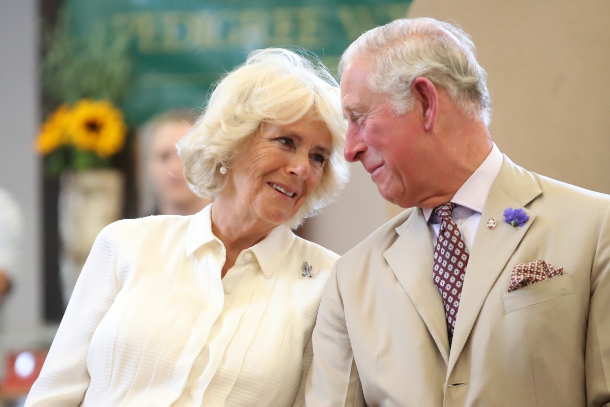 BUILTH WELLS, WALES - JULY 04: Prince Charles, Prince of Wales and Camilla, Duchess of Cornwall look at eachother as they reopen the newly-renovated Edwardian community hall The Strand Hall during day three of a visit to Wales on July 4, 2018 in Builth Wells, Wales. (Photo by Chris Jackson/Getty Images)