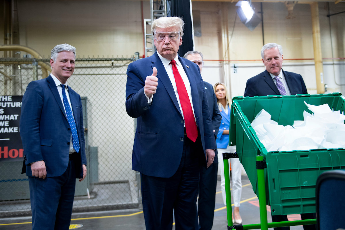 Donald Trump gives a thumbs up while touring a Honeywell International Inc. factory producing N95 masks