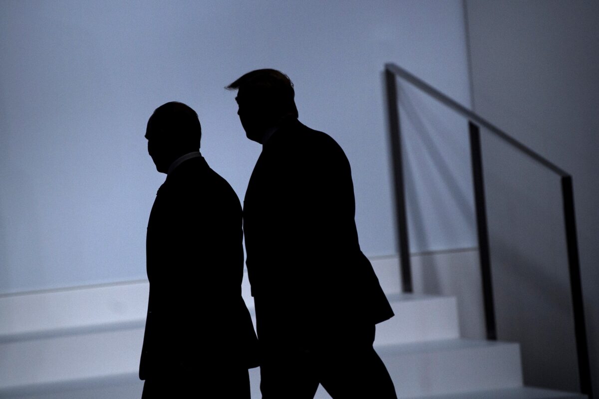 Russia's President Vladimir Putin (L) and US President Donald Trump arrive for a group photo at the G20 Summit in Osaka on June 28, 2019. (Photo by Brendan Smialowski / AFP) (Photo credit should read BRENDAN SMIALOWSKI/AFP via Getty Images)
