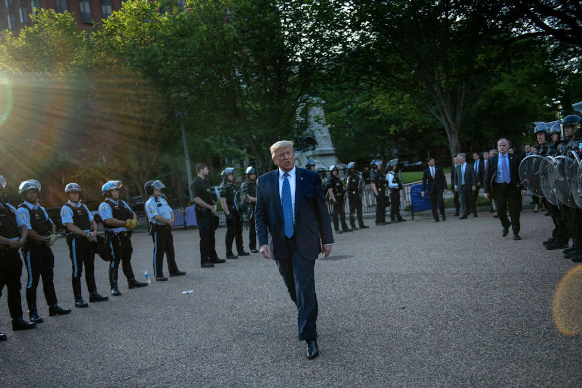 Trump walks between police in D.C. after gassing protesters