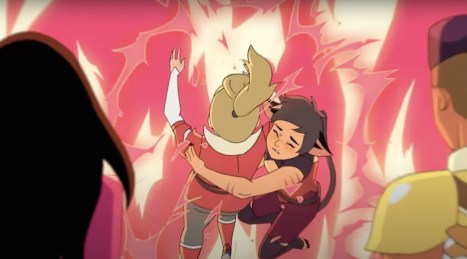 Catra pulls Adora through flames in Netflix's She-Ra and the Princesses of Power.