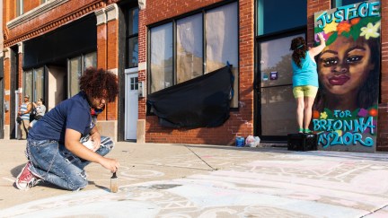 Street artists create work in memory of Breonna Taylor