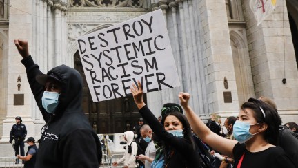 George Floyd Black Lives Matter protestors hold 