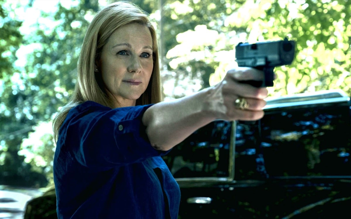 Wendy Byrde aiming a handgun on Netflix's Ozark.
