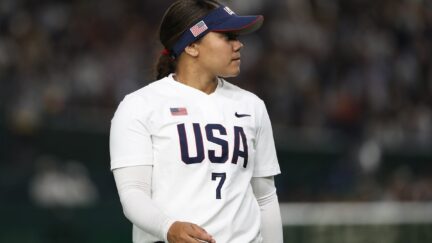 Kelsey Stewart #7 of United States looks on during an Olympic softball game